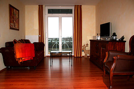 Wohnzimmer der Ferienwohnung 14 in der Villa Wagenknecht