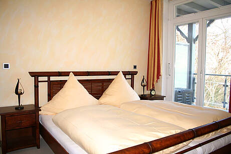 Schlafzimmer Ferienwohnung 14 Villa Wagenknecht Schlafzimmer der Ferienwohnung 14 in der Villa Wagenknecht