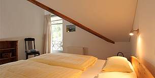 Schlafzimmer Ferienwohnung 10 Villa Seegarten