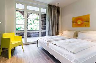 Schlafzimmer der Ferienwohnung 06 in der Villa Höger