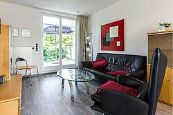 Wohnzimmer der Ferienwohnung 11 in der Villa Höger