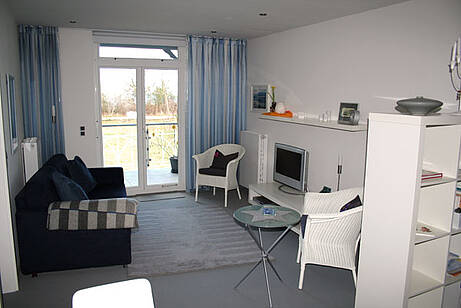 Wohnzimmer Ferienwohnung 08 Villa Wagenknecht Wohnzimmer der Ferienwohnung 08 in der Villa Wagenknecht
