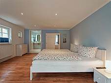 Schlafzimmer Ferienwohnung 01 Delfin Strandvilla Muschel