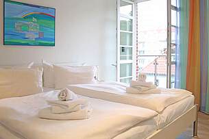 Schlafzimmer der Ferienwohnung 09 in der Villa Höger