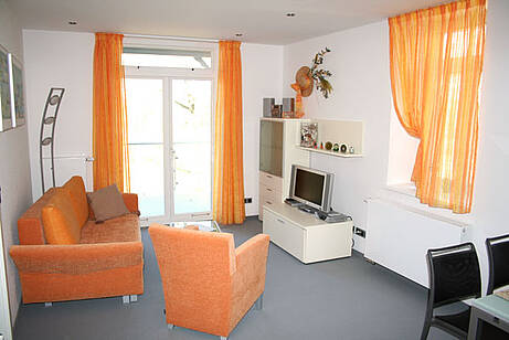 Wohnzimmer der Ferienwohnung 07 in der Villa Wagenknecht