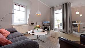 Wohnzimmer in der Ferienwohnung 26 der Villa Seebach 