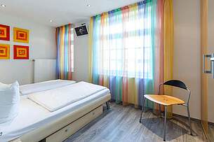 Schlafzimmer der Ferienwohnung 11 in der Villa Höger